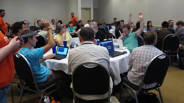 sprint workshop participants raising hands